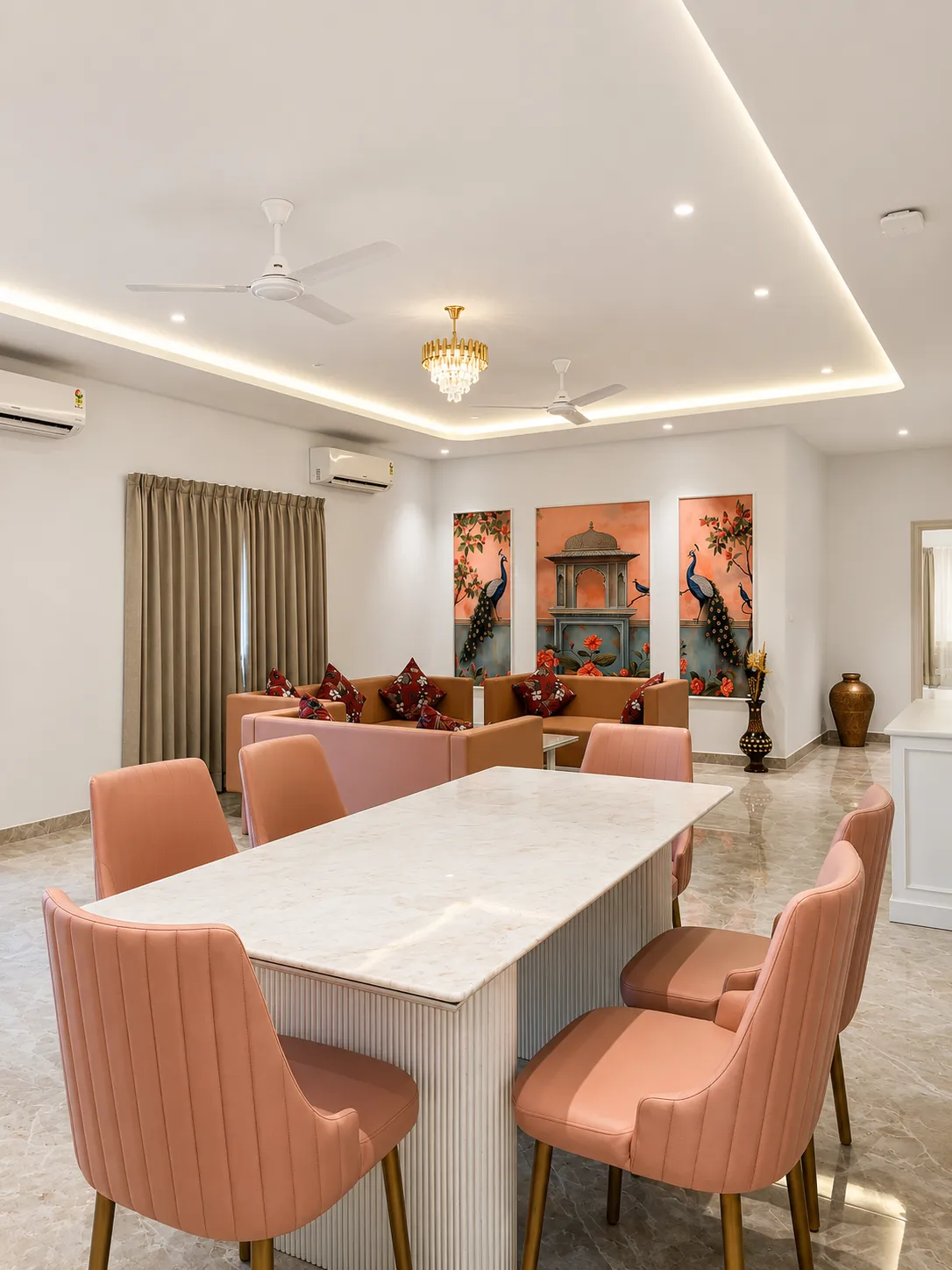The dining room and lounge in one sweep, peacock art beyond