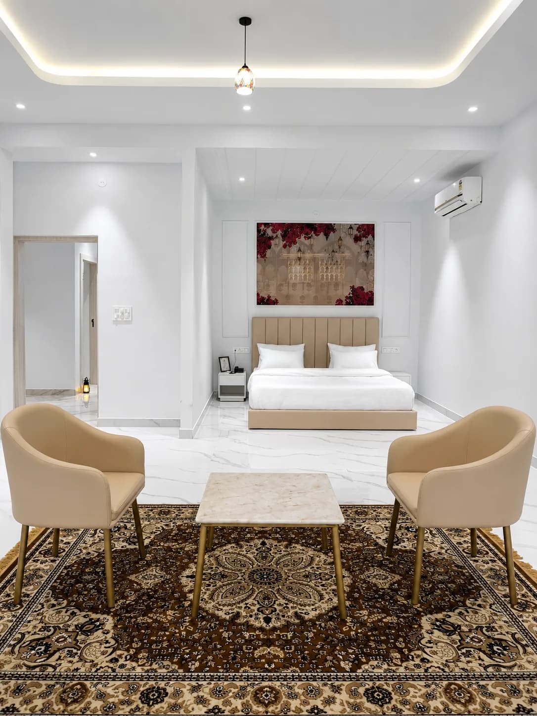 The bougainvillea room's sitting area and armchairs