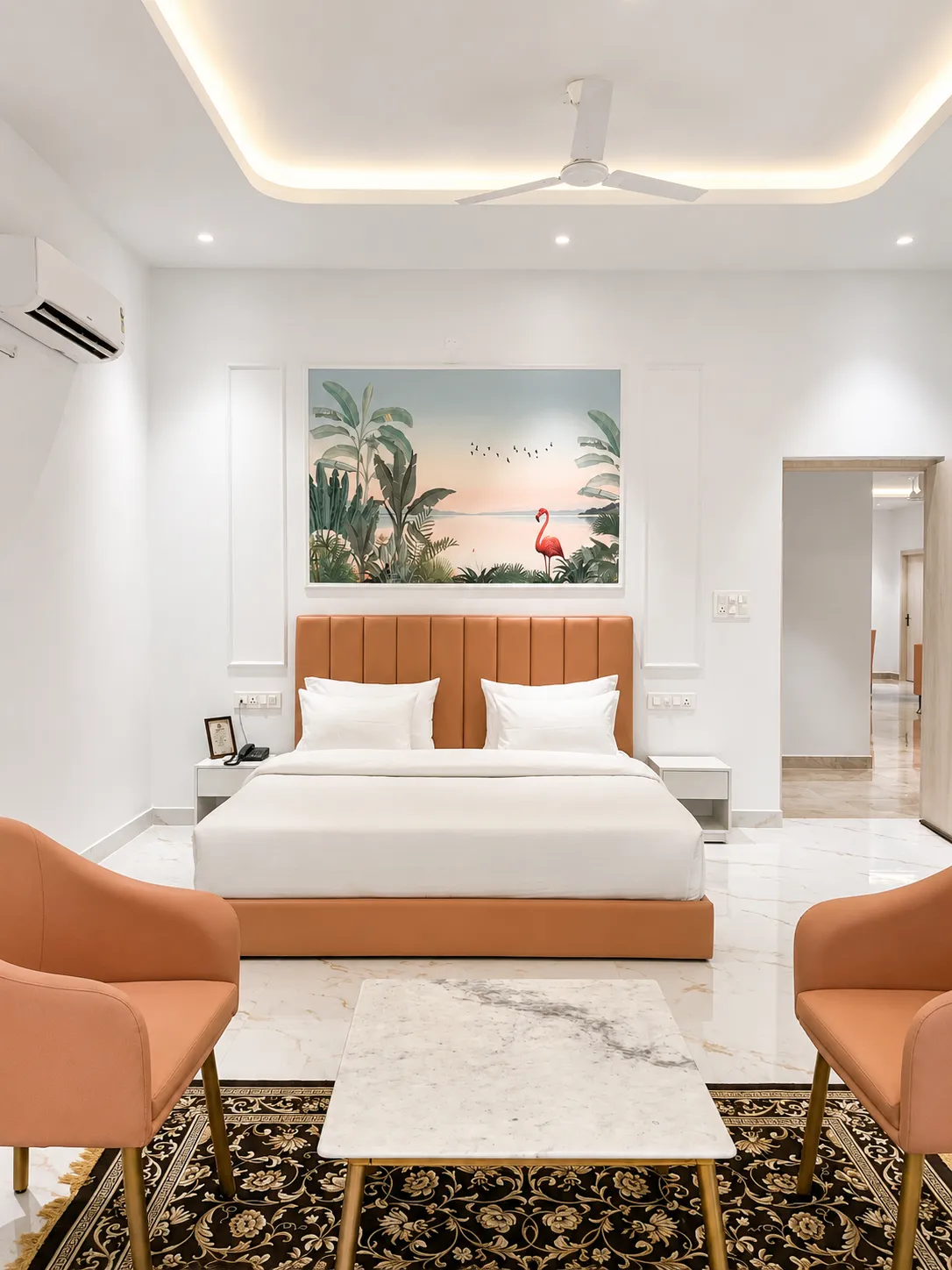 Bedroom with terracotta bed and tropical flamingo artwork
