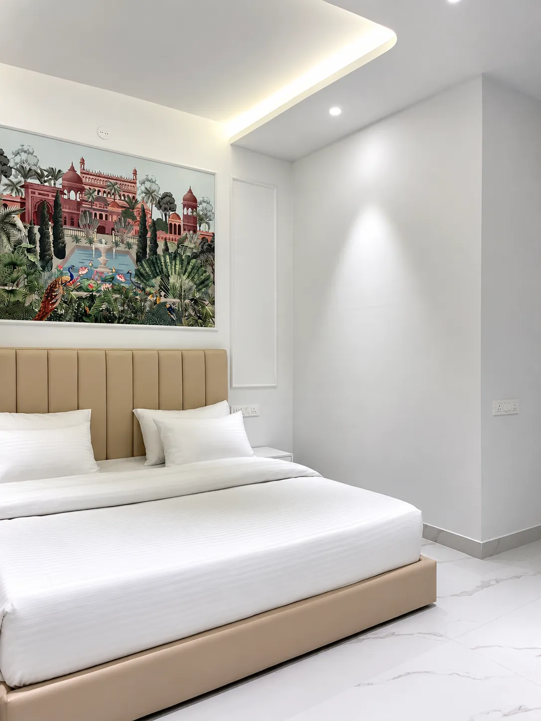 Beige bed beneath a pink palace-garden mural with peacocks