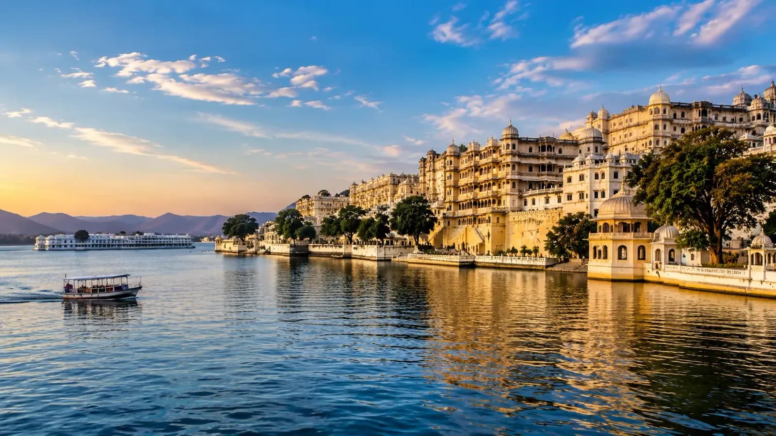 Udaipur's City Palace on Lake Pichola at dusk