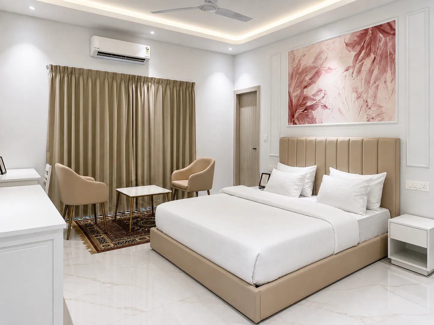 Bedroom with champagne bed and rose-toned botanical artwork